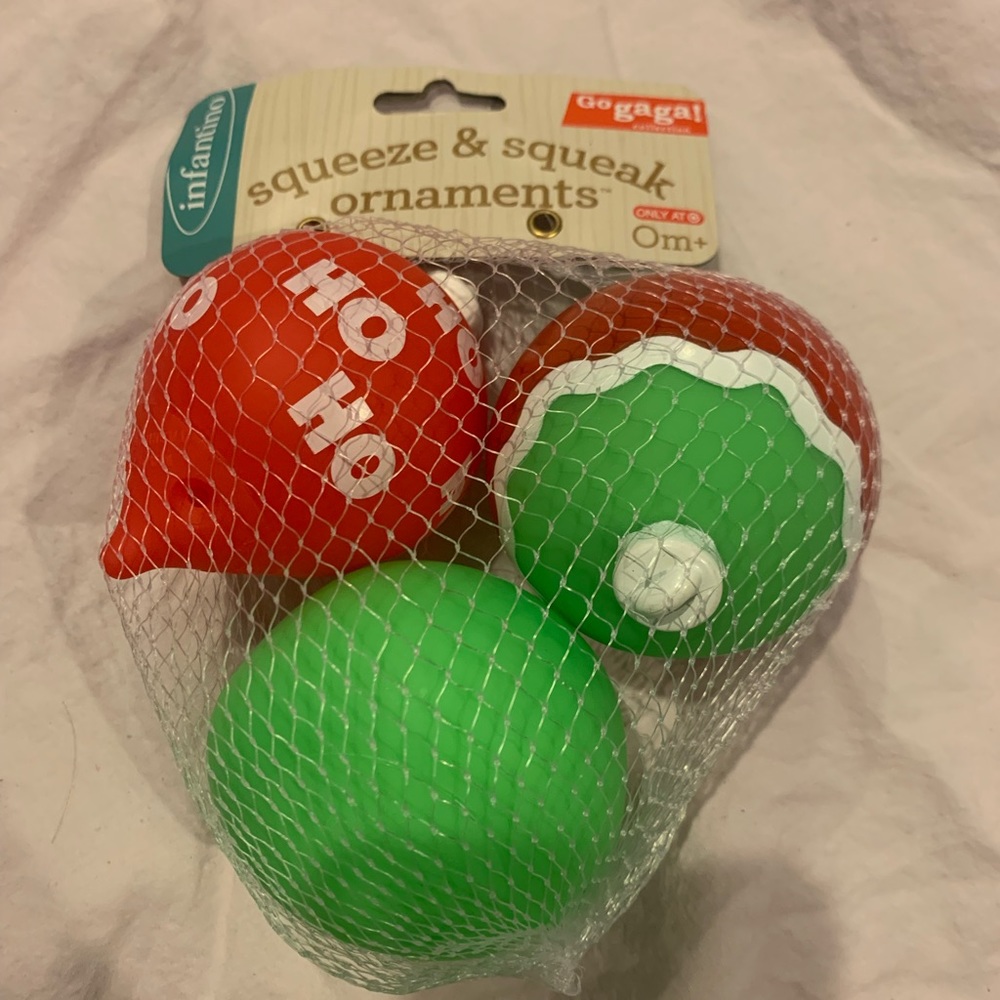 New infantino squeeze & sqeak ornaments